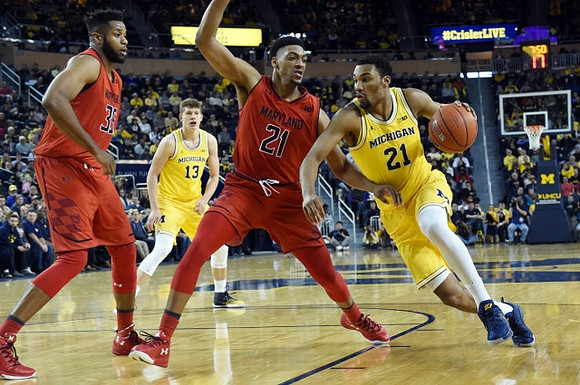 Moritz Wagner (13) and Zak Irvin (21)