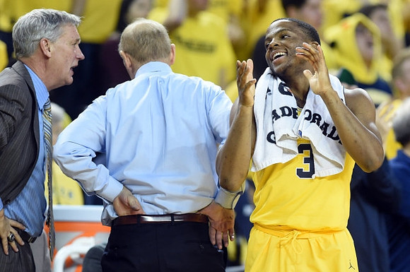 Jeff Meyer, John Beilein, and Xavier Simpson (3)