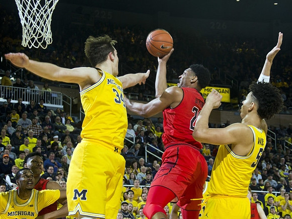 Muhammad-Ali Abdur-Rahkman (12), Mark Donnal (34), and D.J. Wilson (5)