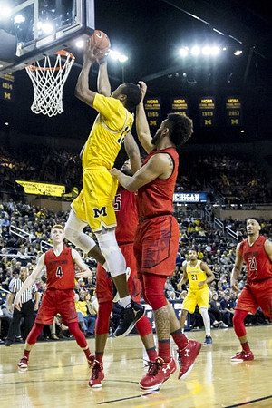Muhammad-Ali Abdur-Rahkman (12) and Zak Irvin (21)