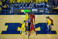 D.J. Wilson (5), Zak Irvin (21), and Moritz Wagner (13)