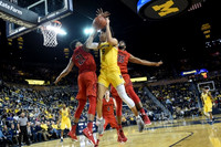D.J. Wilson (5), Zak Irvin (21), and Derrick Walton Jr. (10)