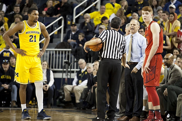 Zak Irvin (21) and Maryland Head Coach Mark Turgeon