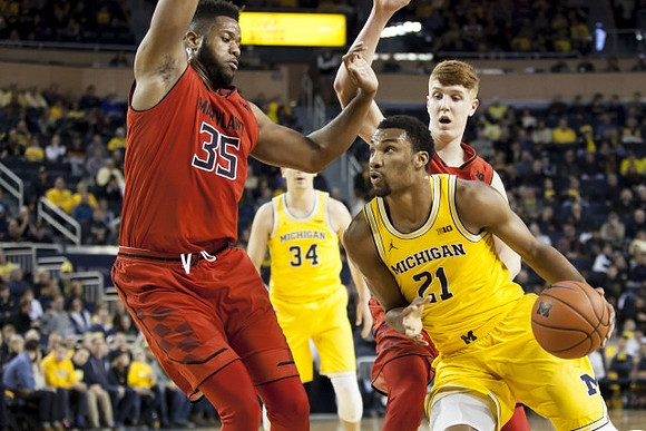 Mark Donnal (34) and Zak Irvin (21)