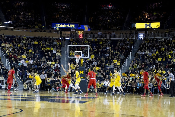 Derrick Walton Jr. (10), Muhammad-Ali Abdur-Rahkman (12), Zak Irvin (21), and Duncan Robinson (22)