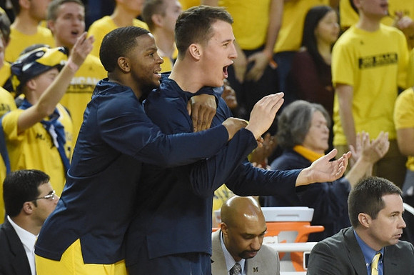 Xavier Simpson (3), Andrew Dakich (11) , Saddi Washington, and Billy Donlon