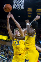 Moritz Wagner (13) and Derrick Walton Jr. (10)