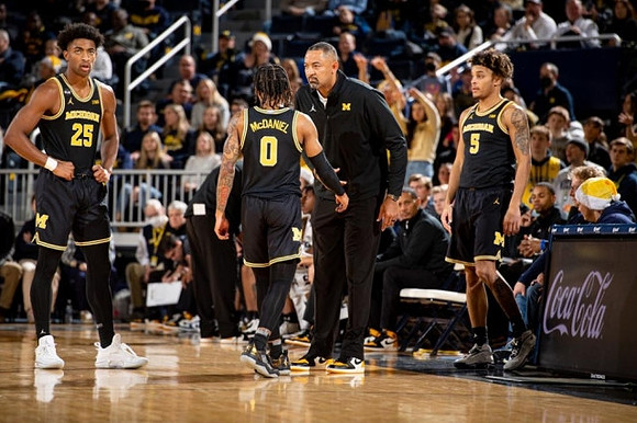 Jace Howard (25), Dug McDaniel (0), Juwan Howard, and Terrance Williams II (5)