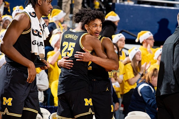 Tarris Reed Jr. (32), Jace Howard (25), and Kobe Bufkin (2)