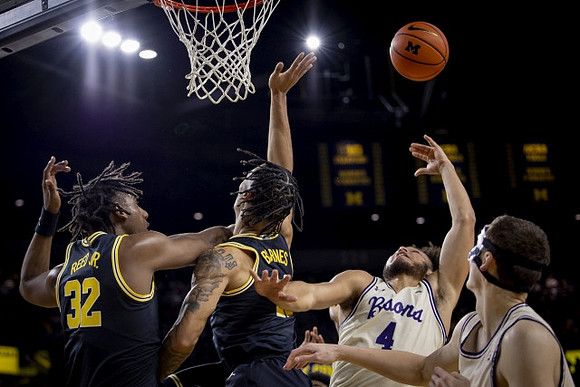 Tarris Reed Jr. (32) and Isaiah Barnes (11)