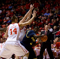 Manny Harris (3) and Jim Boylen (Utah Head Coach)