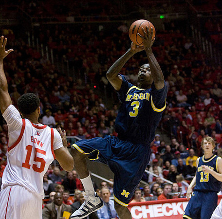 Manny Harris (3) and Matt Vogrich (13)