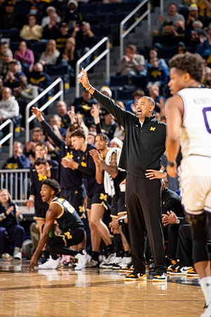 Juwan Howard and Michigan Team