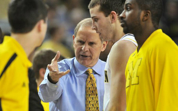 John Beilein, Nik Stauskas (11), and Corey Person (32)