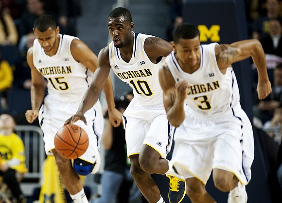 Jon Horford (15), Tim Hardaway Jr. (10), and Trey Burke (3)