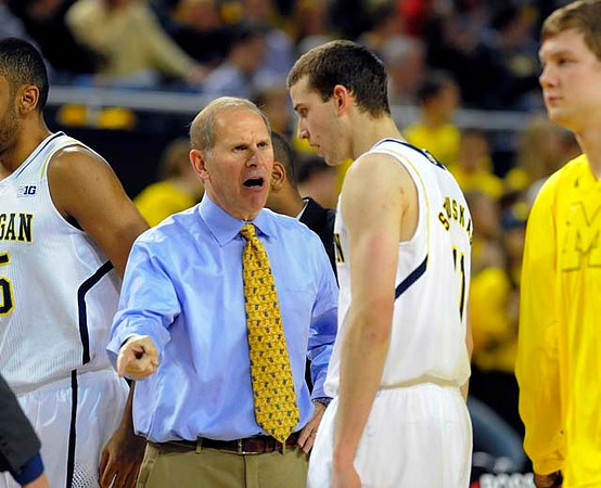 Trey Burke (3), Nik Stauskas (11), and Jon Horford (15)