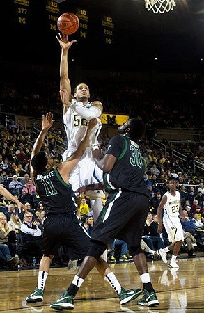 Jordan Morgan (52) and Caris LeVert (23)