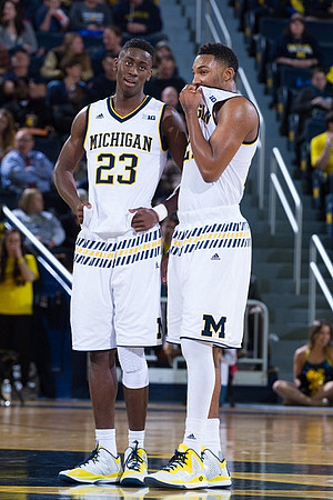 Caris LeVert (23) and Zak Irvin (21)
