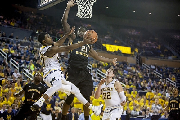 Derrick Walton Jr. (10) and Ricky Doyle (32)