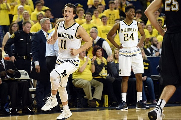 Andrew Dakich (11), Aubrey Dawkins (24), and Jeff Meyer