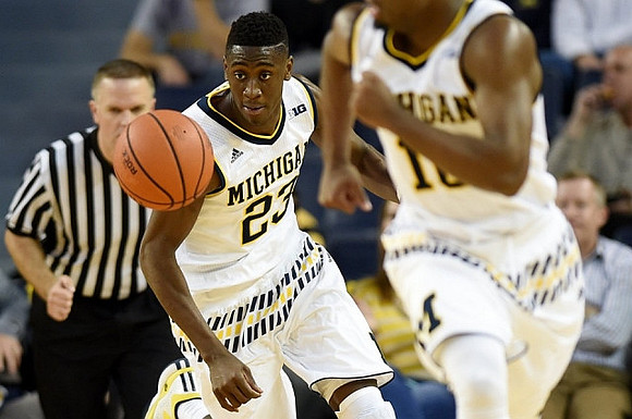 Caris LeVert (23) and Derrick Walton Jr. (10)