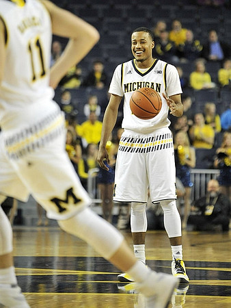 Andrew Dakich (11) and Muhammad-Ali Abdur-Rahkman (12)