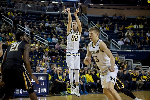 Duncan Robinson (22) and Moritz Wagner (13)