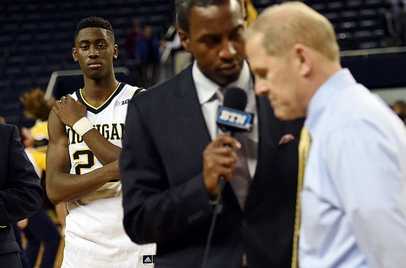 Caris LeVert (23) and John Beilein