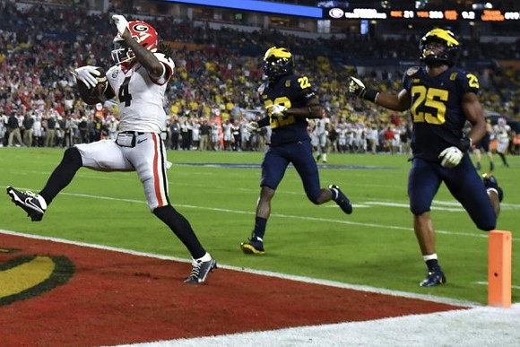 Gemon Green (22) and Junior Colson (25)