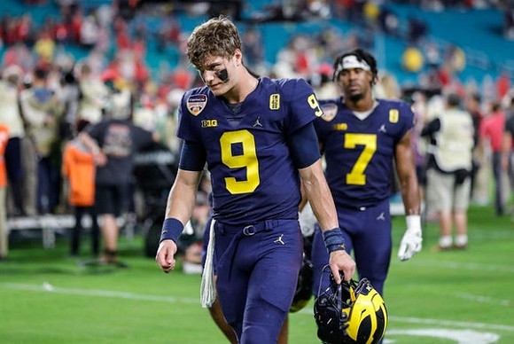 J.J. McCarthy (9) and Donovan Edwards (7)