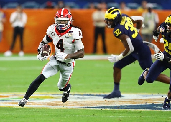 Jaylen Harrell (32) and Junior Colson (25)