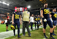 Brad Robbins (91), Julius Welschof (96), Christian Boivin (40), Jaylen Harrell (32), and William Wagner (49)