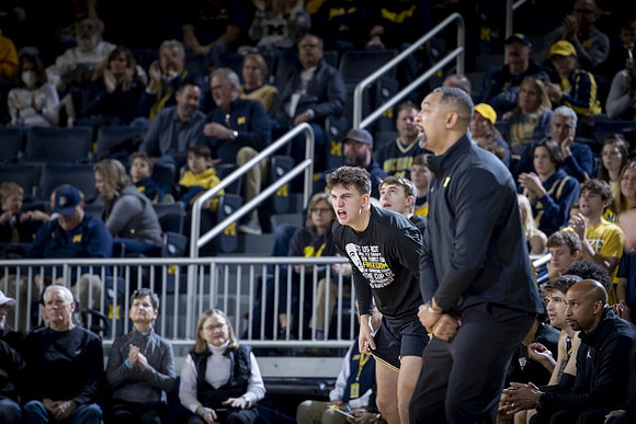 Will Tschetter (42) and Juwan Howard