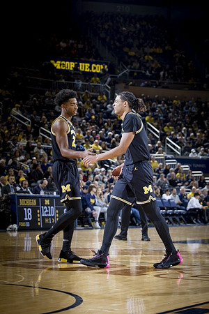 Jace Howard (25) and Jett Howard (13)