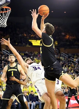 Hunter Dickinson (1) and Will Tschetter (42)