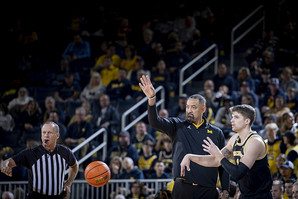 Juwan Howard and Joey Baker (15)