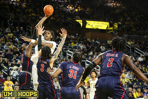 Tarris Reed Jr. (32) and Kobe Bufkin (2)