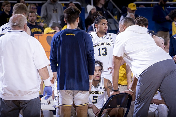 Youssef Khayat (24), Terrance Williams II (5), Jett Howard (13), and Juwan Howard