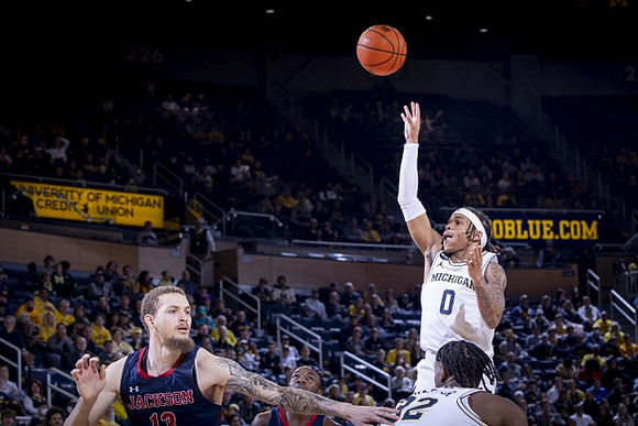 Dug McDaniel (0) and Tarris Reed Jr. (32)