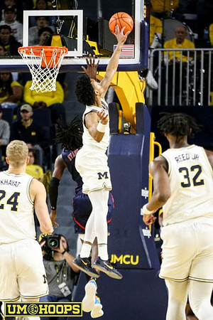 Youssef Khayat (24), Kobe Bufkin (2), and Tarris Reed Jr. (32)