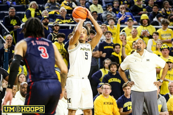 Terrance Williams II (5) and Juwan Howard
