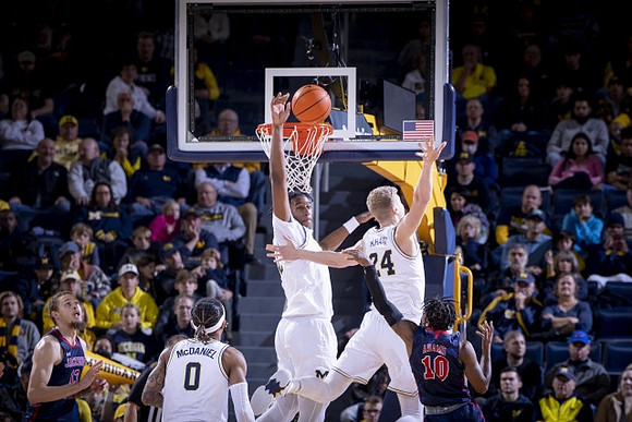Dug McDaniel (0), Tarris Reed Jr. (32), and Youssef Khayat (24)