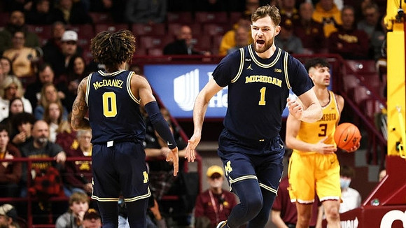 Dug McDaniel (0) and Hunter Dickinson (1)