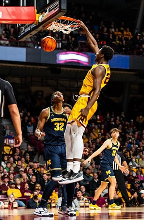 Tarris Reed Jr. (32) and Joey Baker (15)