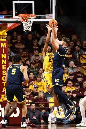 Terrance Williams II (5) and Hunter Dickinson (1)