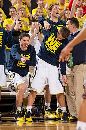 Sean Lonergan (20), Andrew Dakich (5), and Mark Donnal (34)