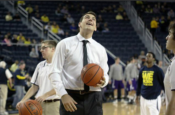 Mitch McGary (4) and Derrick Walton Jr. (10)
