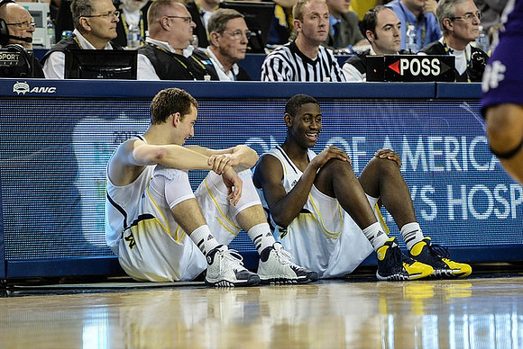 Nik Stauskas (11) and Caris LeVert (23)