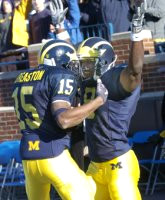 Steve Breaston (15) and Jason Avant (8)