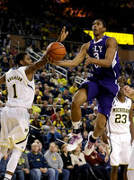 Glenn Robinson III (1) and Caris LeVert (23)